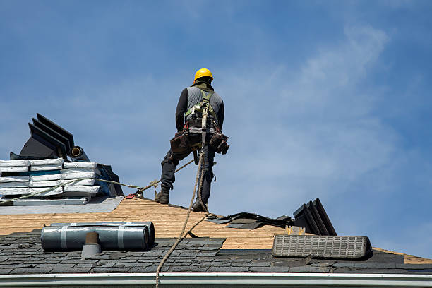 Professional Gutter Installation technician working in Alton, NY